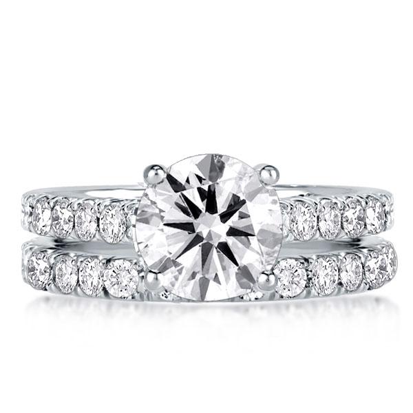 

Classic Three-Quarters Four Prong Round Cut Bridal Set, White