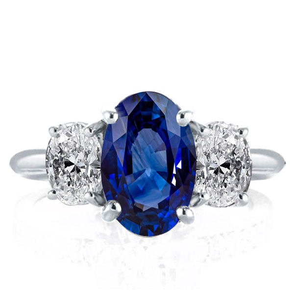 

Italo Three Stone Oval Cut Blue Sapphire Engagement Ring, White