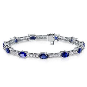 Italo Oval Cut Blue Sapphire Tennis Bracelets In Sterling Silver