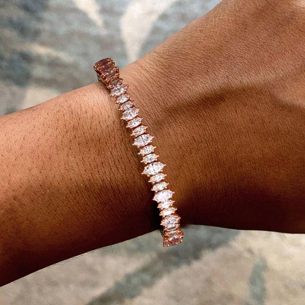 How Can You Style a Rose Gold Bracelet with Other Jewelry Pieces?