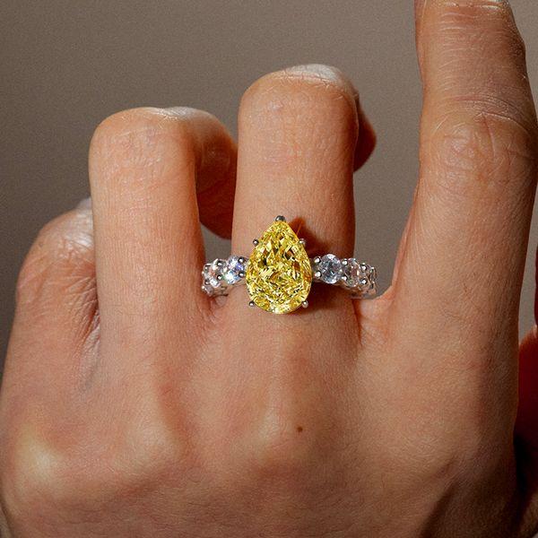 Discover the Elegance of the Pear Topaz Mother's Ring at Italo Jewelry