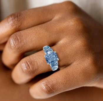 The Allure of Blue Topaz Wedding Ring: Symbolism, Meaning, and Comparison with Red Wedding Rings